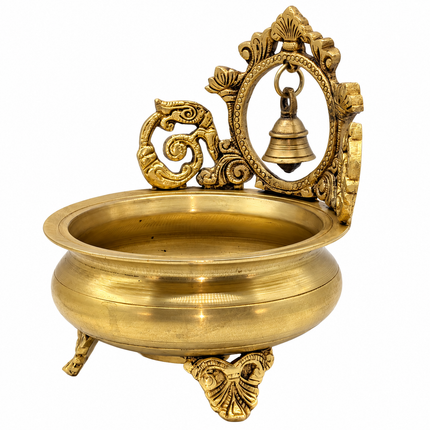 Ornate Tabletop Prabhavali Urli with Temple Bell Backdrop