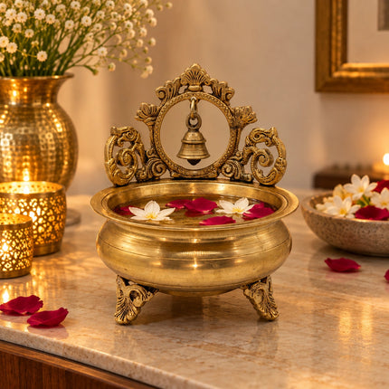 Ornate Tabletop Prabhavali Urli with Temple Bell Backdrop