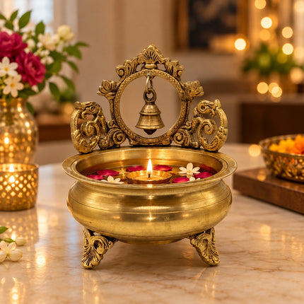 Ornate Tabletop Prabhavali Urli with Temple Bell Backdrop
