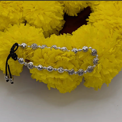Delicate Bracelet with Flower Motifs on Beads in German Silver - Handmade Indian Artisanal - The Ganges Store